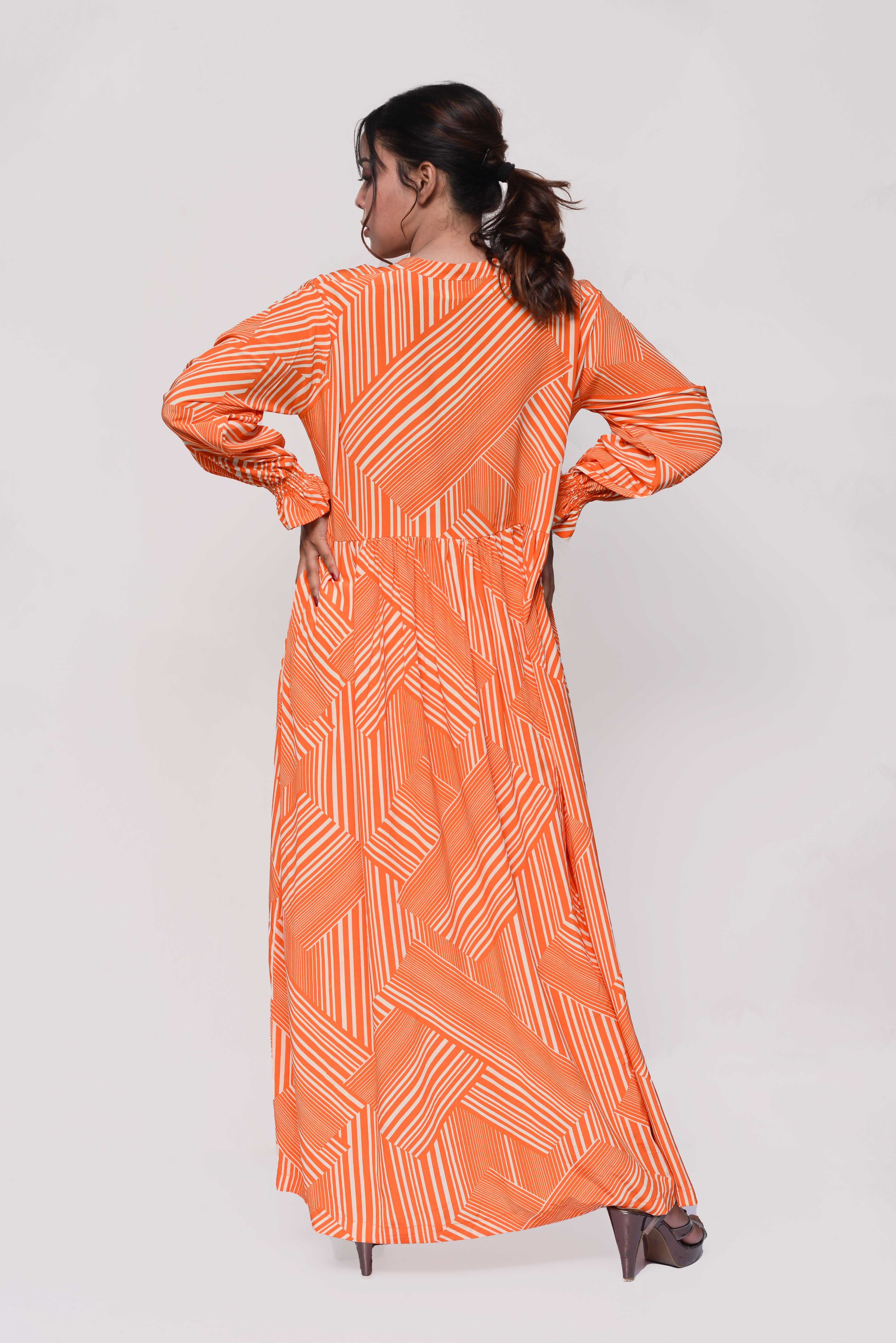 🧡 Sunset Geo Maxi Dress – Bold, Modern & Effortlessly Modest